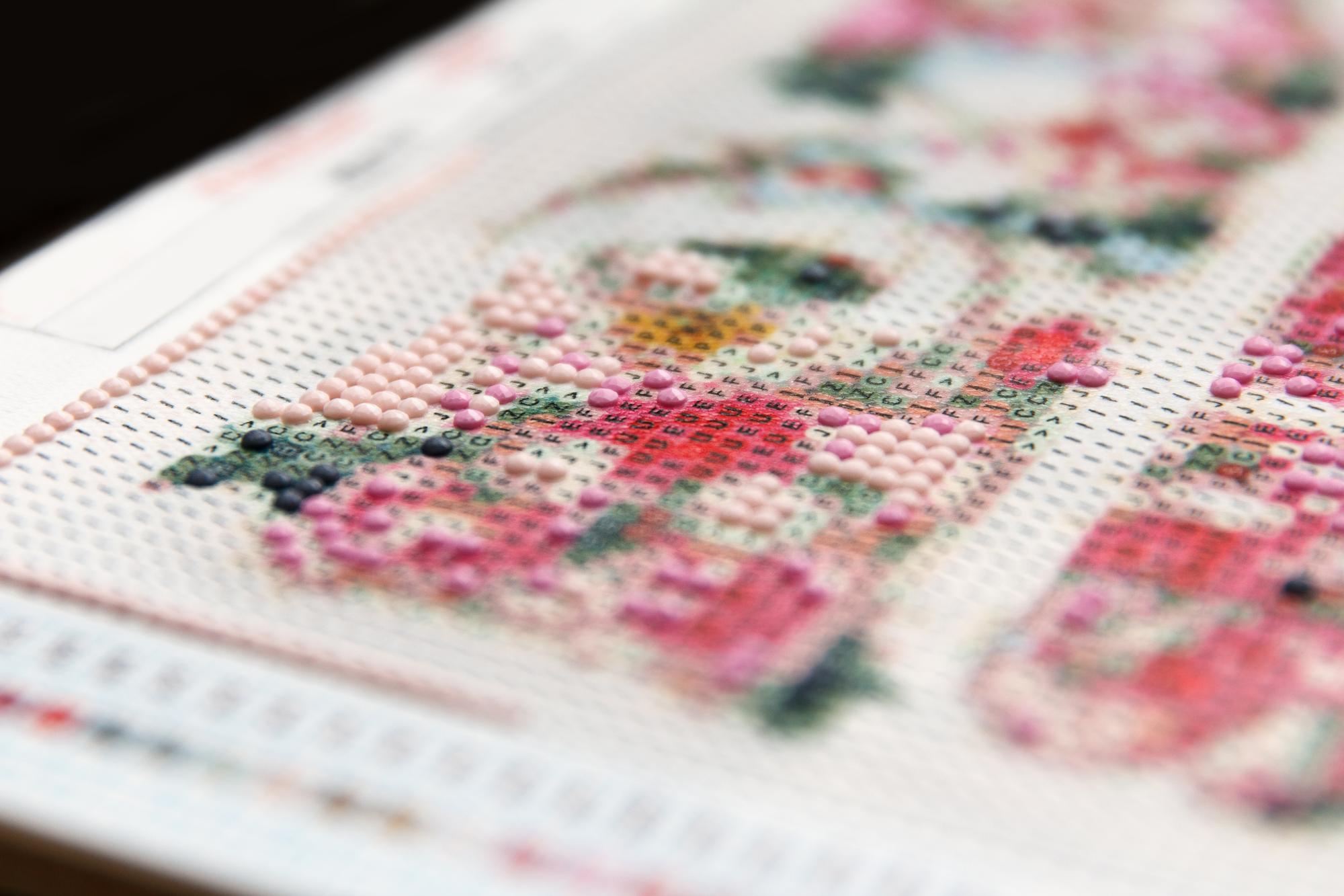 Workshop window with embroidered samples